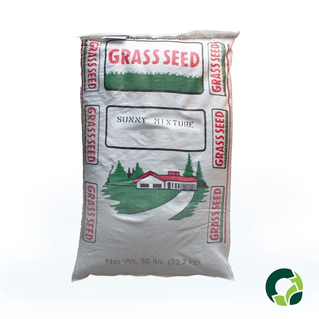 A bag of grass seed with farm and field illustrations on the packaging.