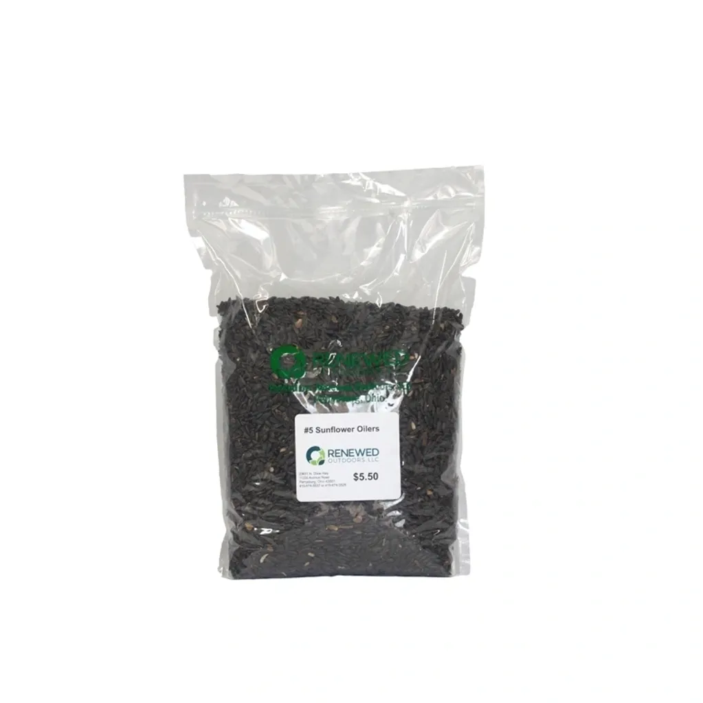 A sealed plastic bag filled with black cable ties.
