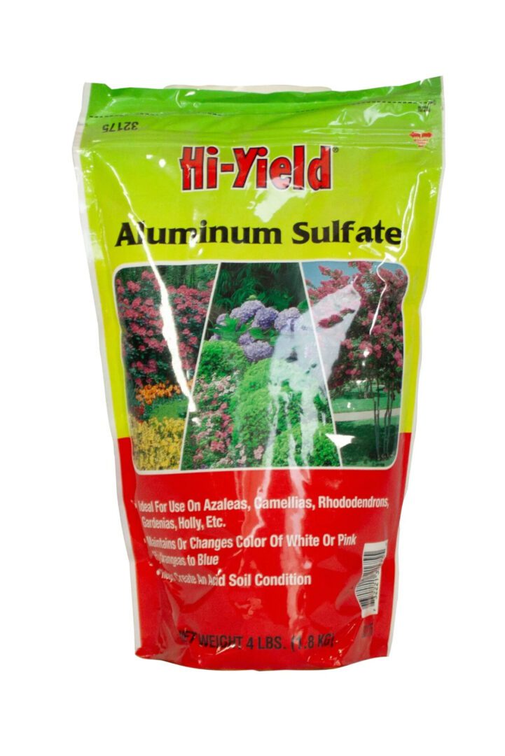Hi-Yield Aurinium Sulfate fertilizer package with plant and dog images.