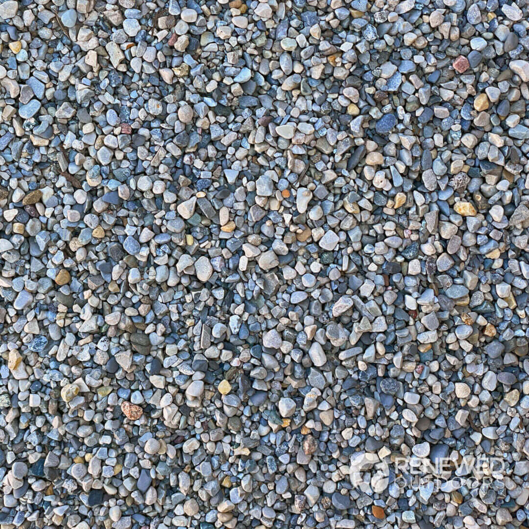 Small, multicolored pebbles scattered on ground.