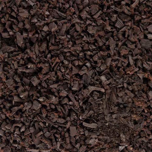 Close-up of dark chocolate shavings texture.
