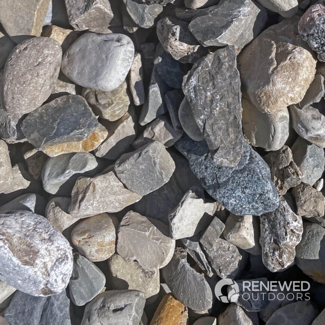 Close-up of assorted gray and beige stones.
