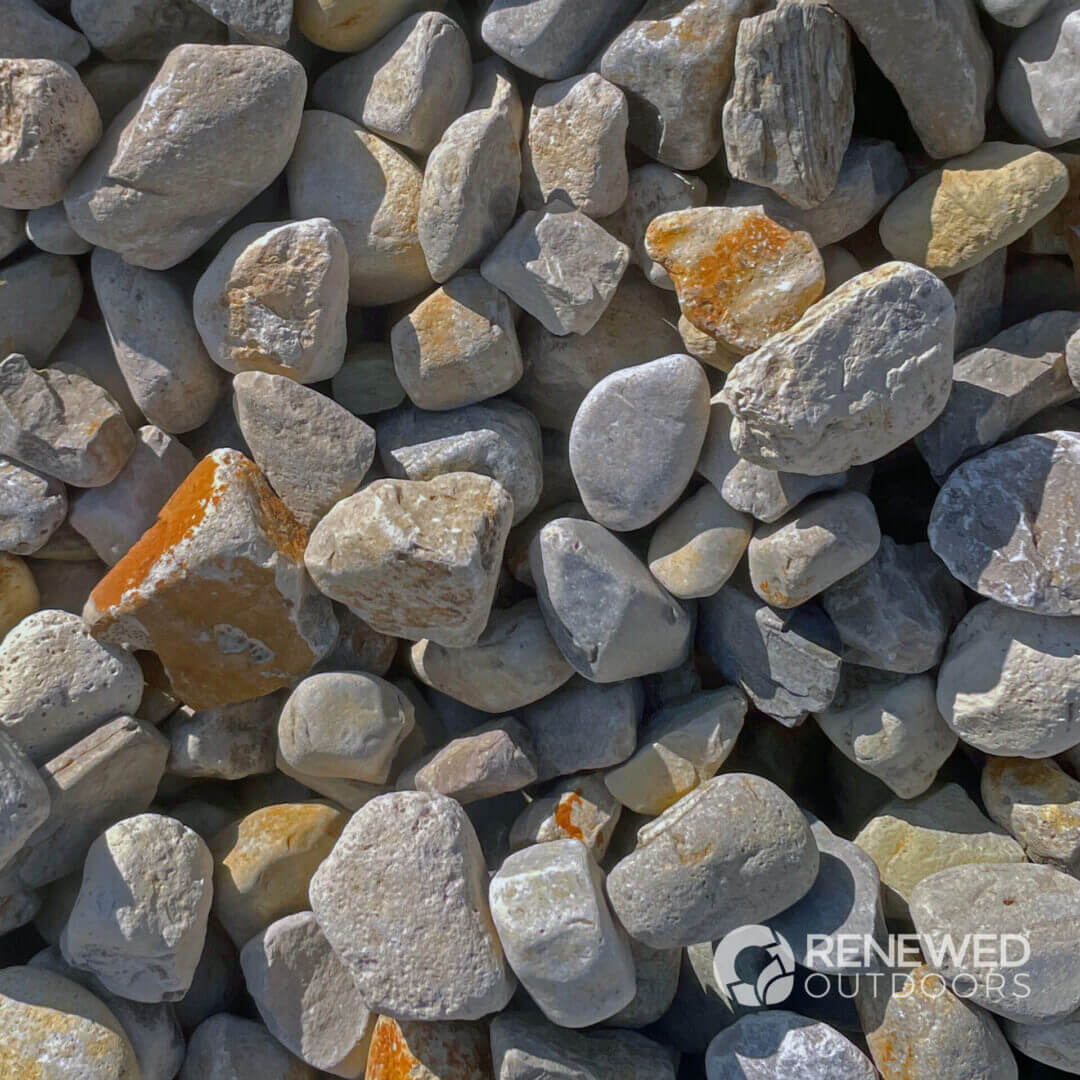 Pile of assorted small, smooth stones.
