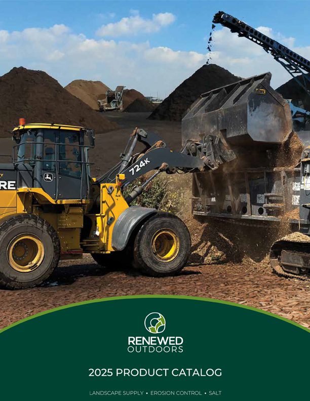 Loader moving dirt at construction site.